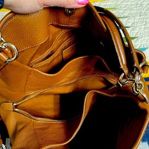 Coach pebbled leather purse with double strap and gorgeous color.  Retails $598